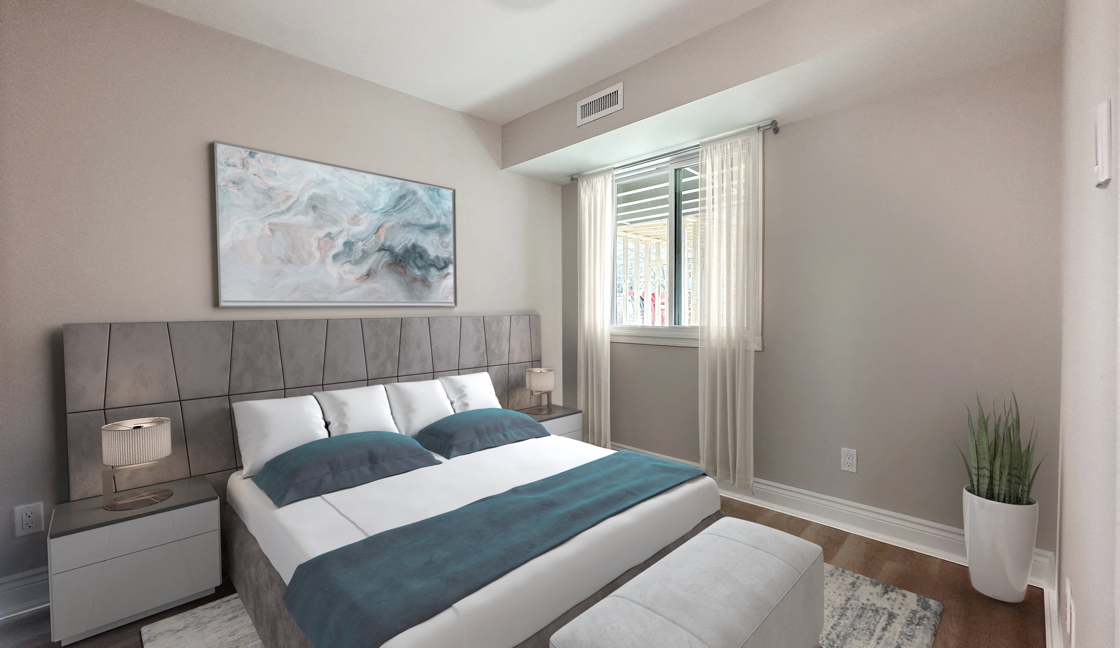 a bedroom with a bed and a large window